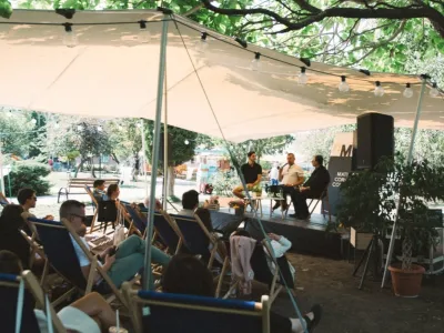 African tent set up at a summer university, where guests listen to a lecture comfortably, protected from the sun and rain.