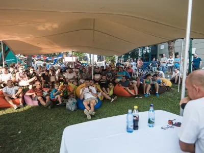An African tent set up at a summer university, where guests listen to a lecture comfortably in the shade, protected from the sun and heat.